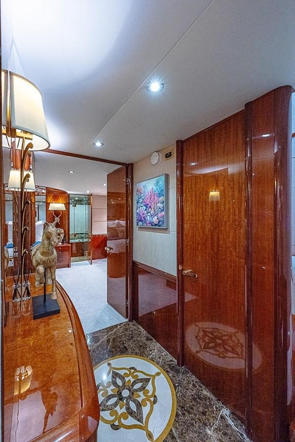 a bathroom with a large mirror aboard LAZZARA 116 OPEN BRIDGE Yacht for Sale