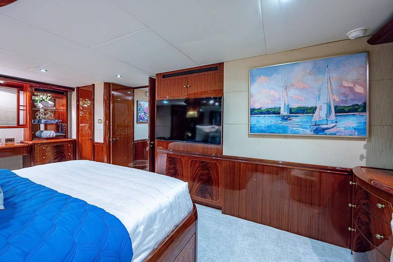 a bedroom with a large bed aboard LAZZARA 116 OPEN BRIDGE Yacht for Sale