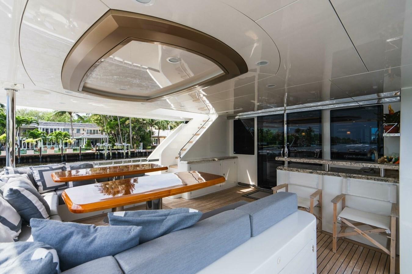 a room with a large glass ceiling aboard NEW ARRIVAL Yacht for Sale