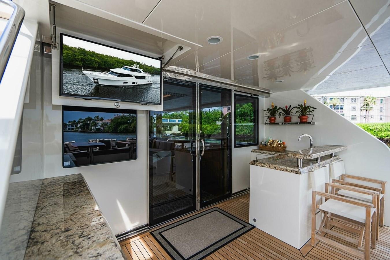 a kitchen with glass doors aboard NEW ARRIVAL Yacht for Sale