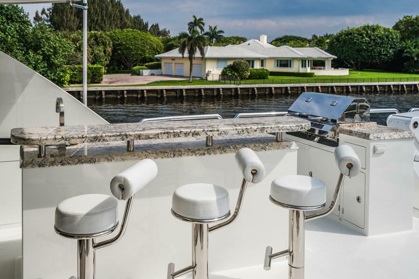 a pool with a deck and chairs aboard NEW ARRIVAL Yacht for Sale