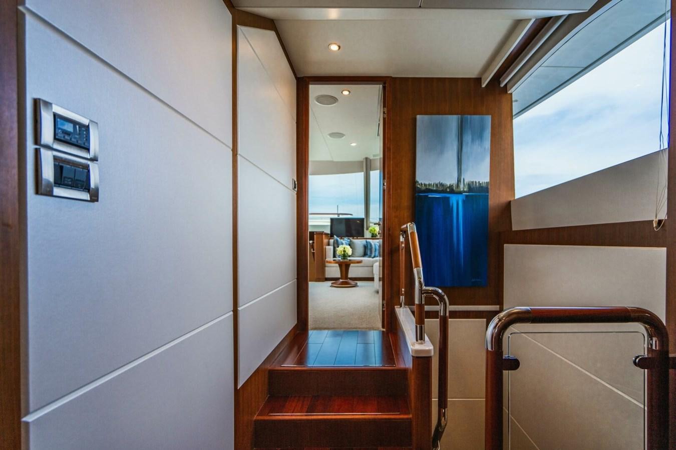 a hallway with a glass door aboard NEW ARRIVAL Yacht for Sale