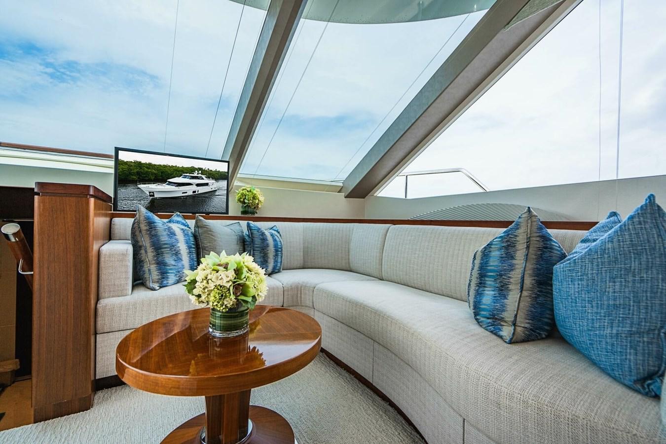 a living room with a large window aboard NEW ARRIVAL Yacht for Sale