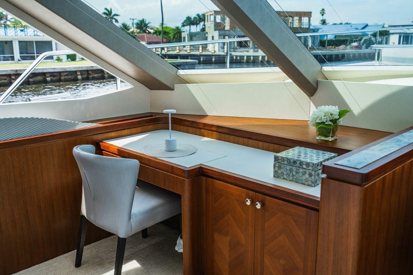 a table with a plant on it aboard NEW ARRIVAL Yacht for Sale