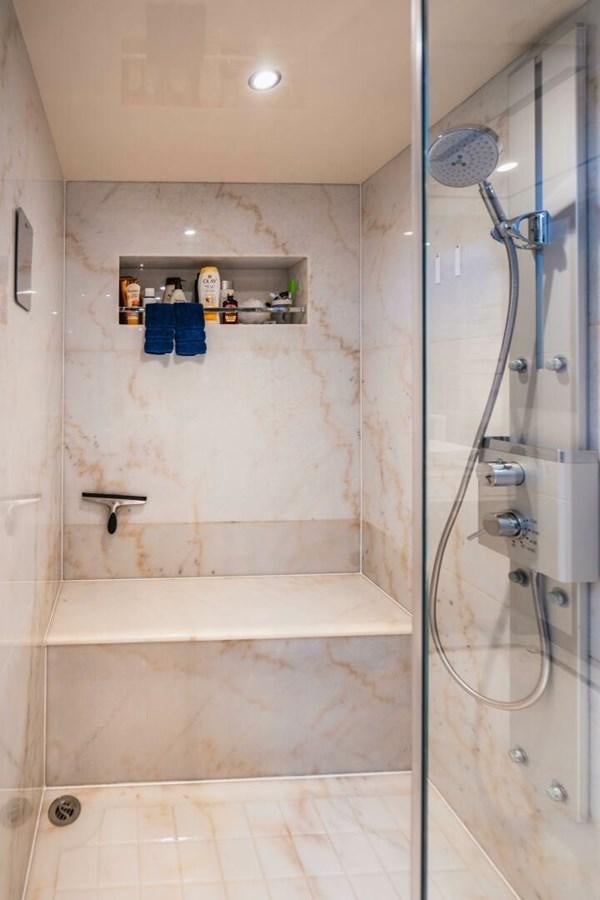 a shower with a glass door aboard NEW ARRIVAL Yacht for Sale