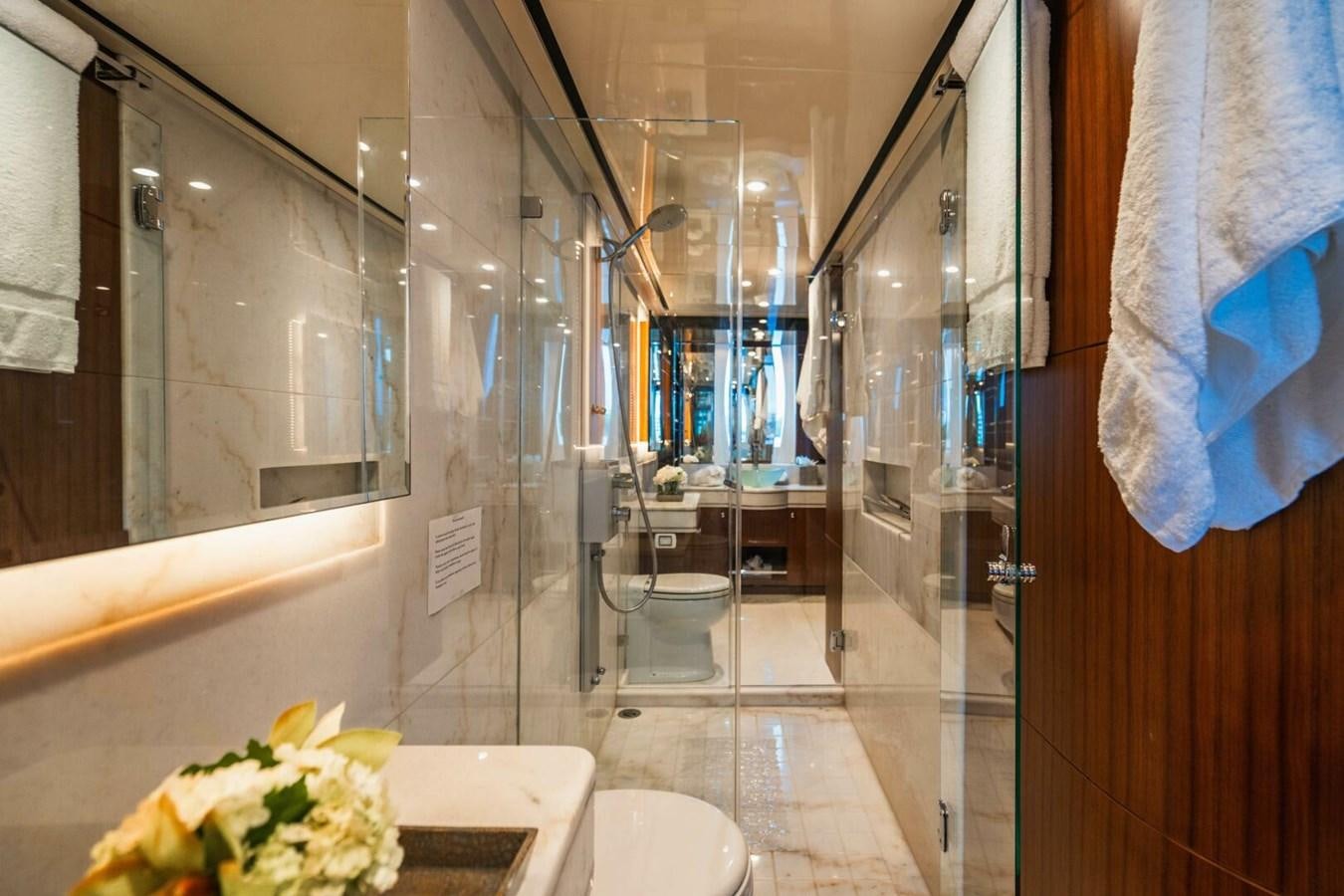 a bathroom with a glass shower aboard NEW ARRIVAL Yacht for Sale