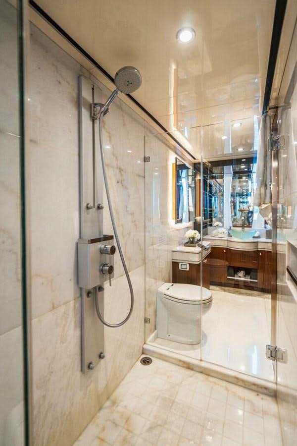 a bathroom with a shower and toilet aboard NEW ARRIVAL Yacht for Sale