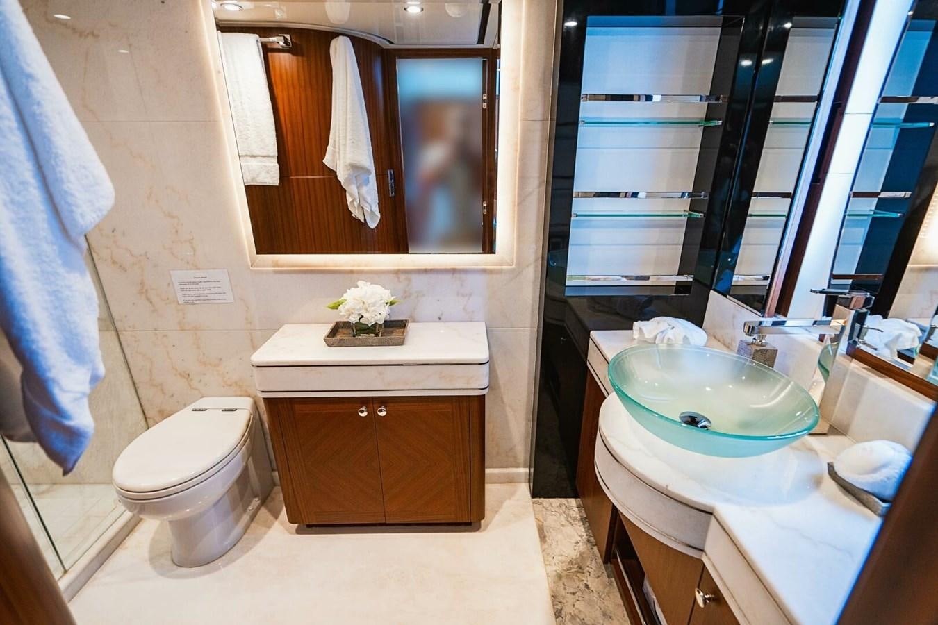 a bathroom with a sink and a toilet aboard NEW ARRIVAL Yacht for Sale