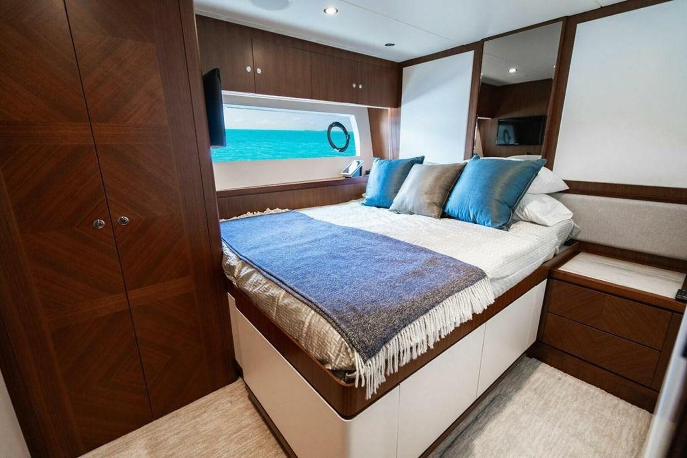 a bed in a room aboard NEW ARRIVAL Yacht for Sale