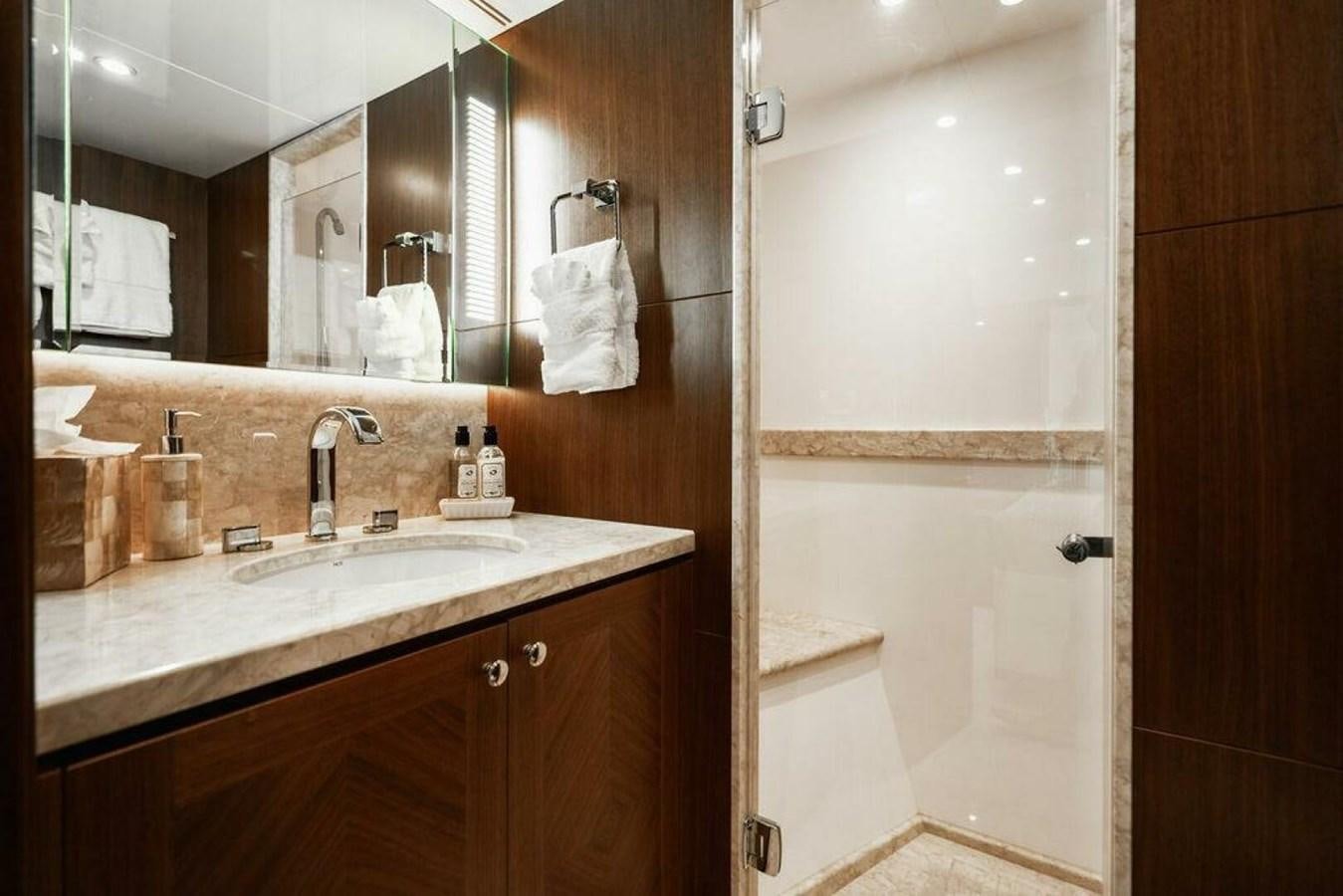 a bathroom with a large mirror aboard NEW ARRIVAL Yacht for Sale