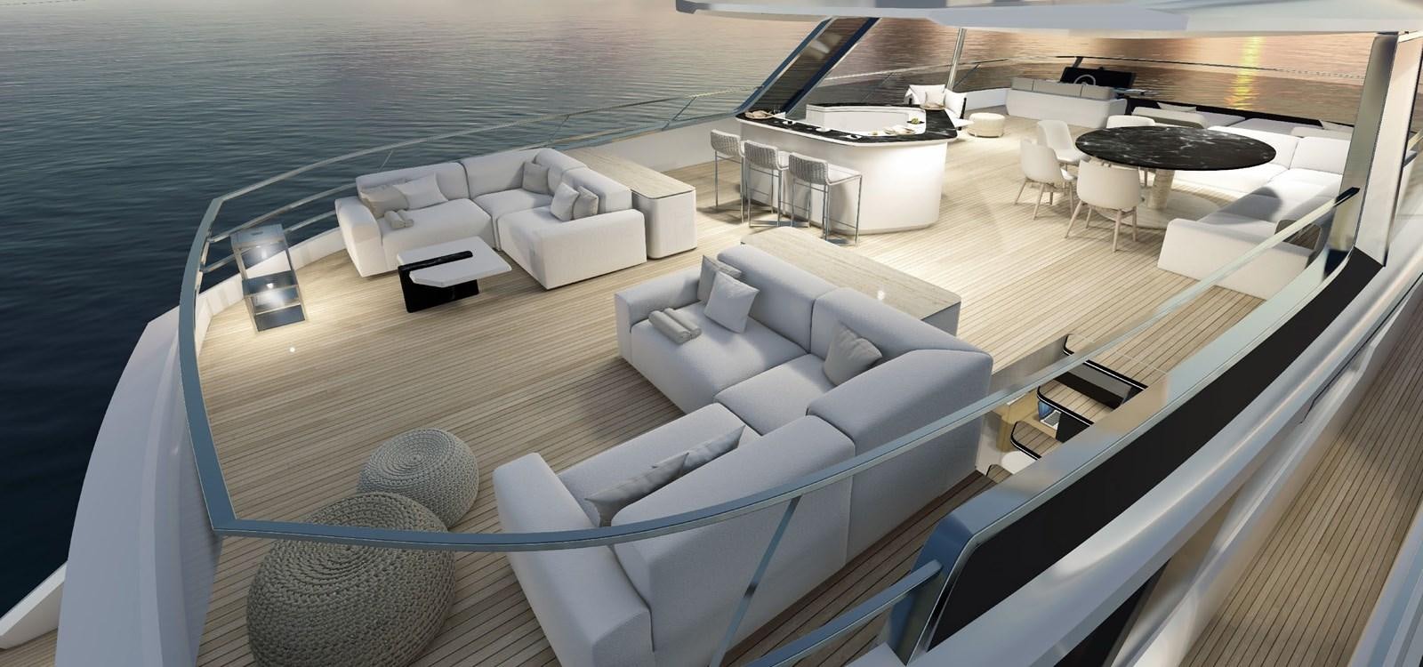 a large white lounge chair on a boat aboard XCEL 70 Yacht for Sale
