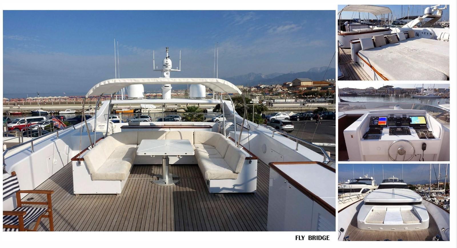 a large building with a white tower aboard SPYK Yacht for Sale