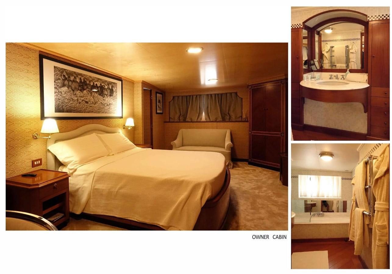 a hotel room with a double bed aboard SPYK Yacht for Sale