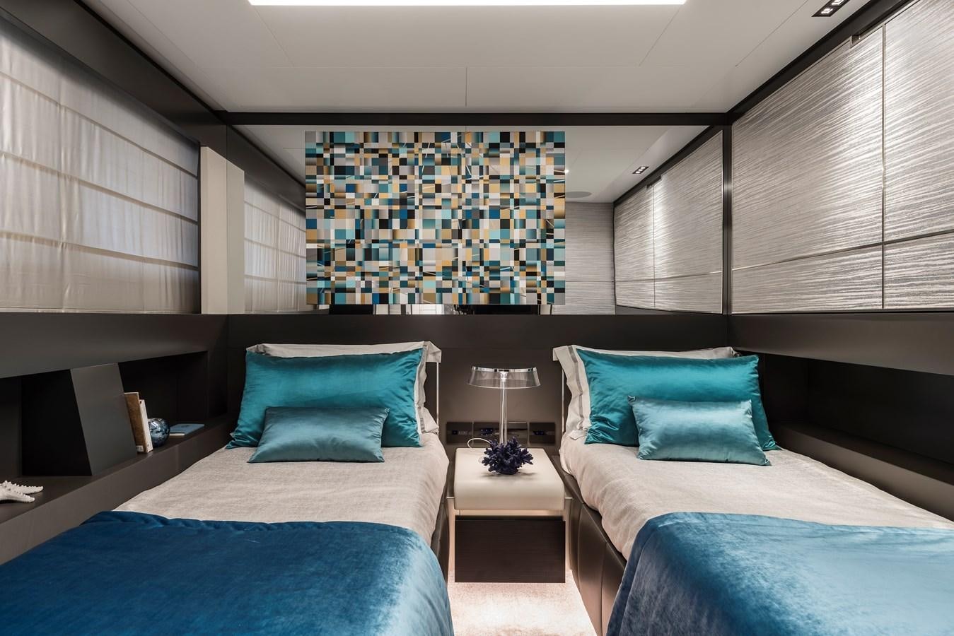 a room with two beds aboard CHORUSLINE Yacht for Sale