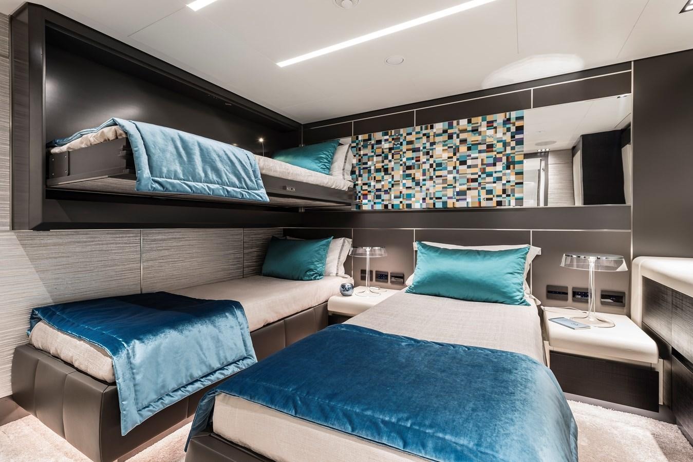 a couple of beds in a room aboard CHORUSLINE Yacht for Sale