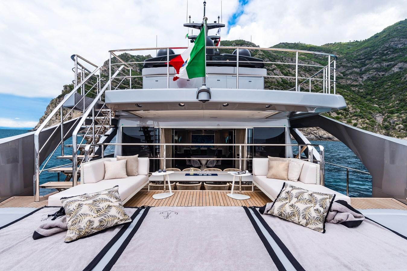 a large white boat on a body of water aboard CHORUSLINE Yacht for Sale