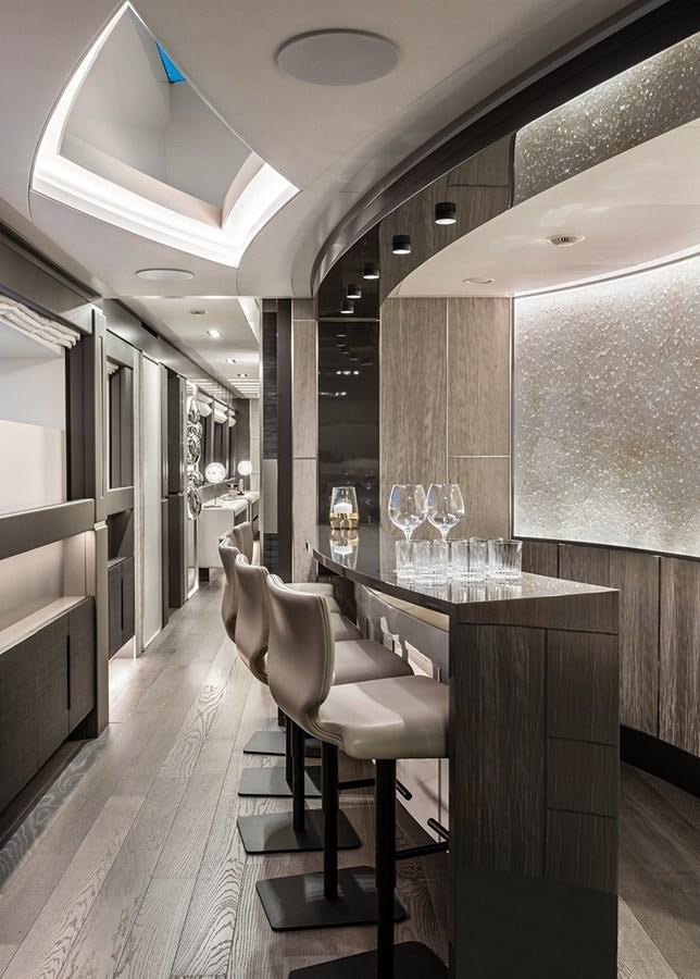 a room with a table and chairs aboard CHORUSLINE Yacht for Sale