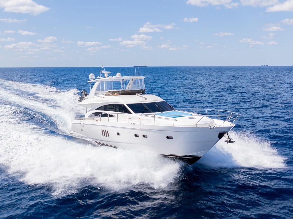 a white yacht on the water aboard COOL BREEZE Yacht for Sale
