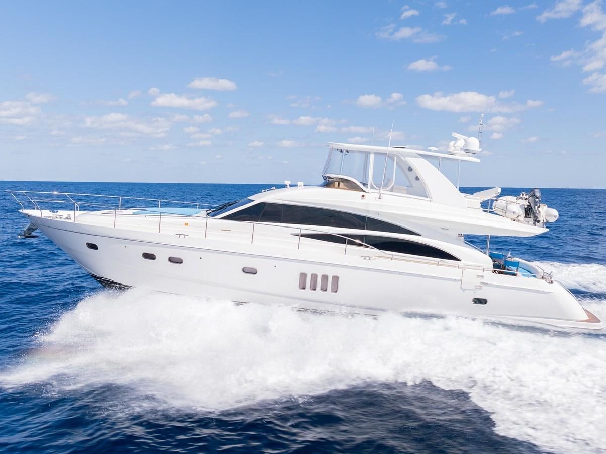 a white yacht on the water aboard COOL BREEZE Yacht for Sale