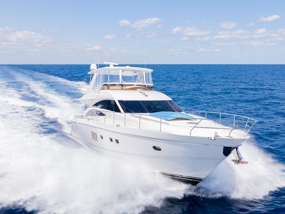 a white yacht on the water aboard COOL BREEZE Yacht for Sale