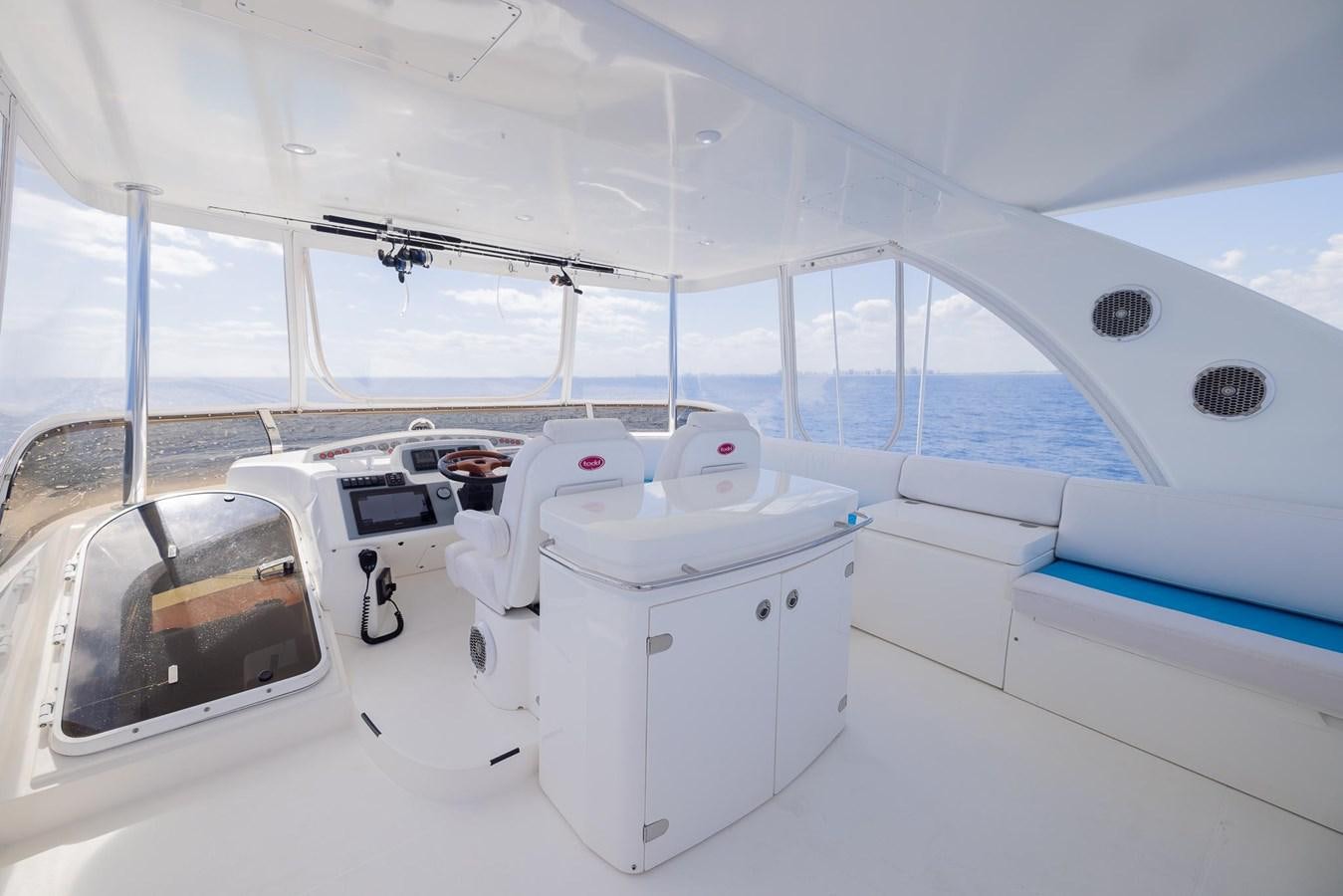 a white room with a white object and a window aboard COOL BREEZE Yacht for Sale