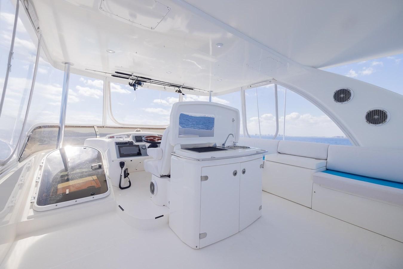 a white machine in a room aboard COOL BREEZE Yacht for Sale