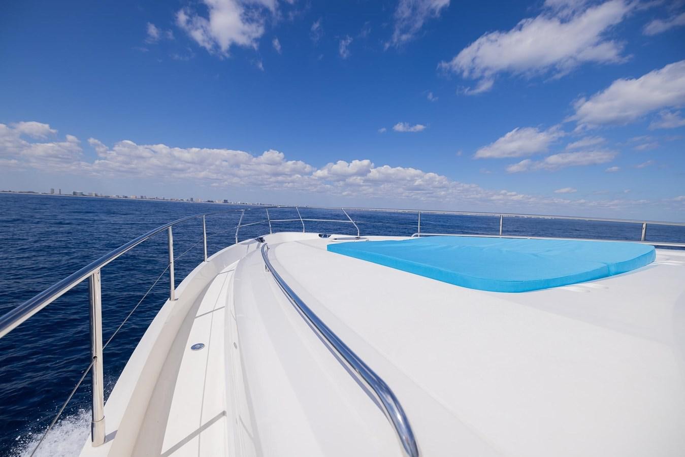 a long white bridge over water aboard COOL BREEZE Yacht for Sale