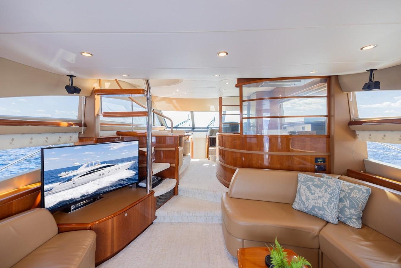 a living room with a large window aboard COOL BREEZE Yacht for Sale