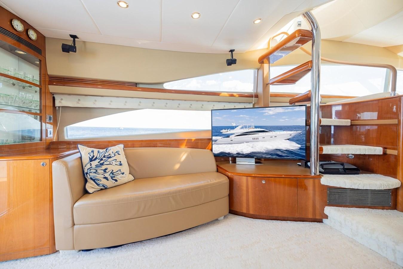 a living room with a couch and a bed aboard COOL BREEZE Yacht for Sale