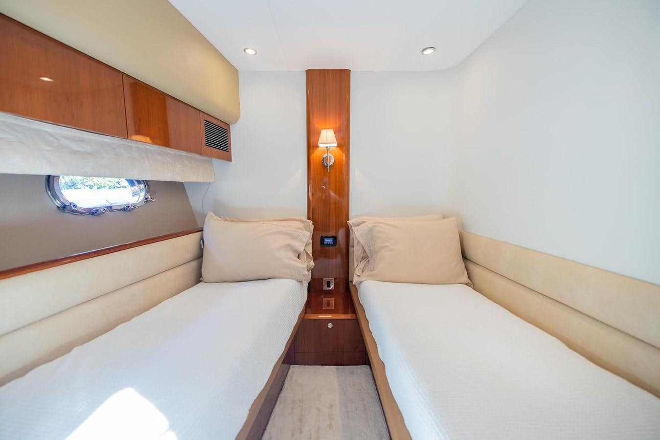 a room with two beds aboard COOL BREEZE Yacht for Sale