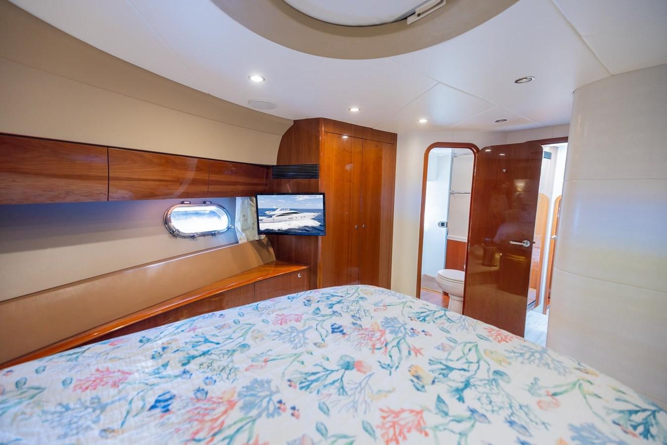 a bed in a room aboard COOL BREEZE Yacht for Sale