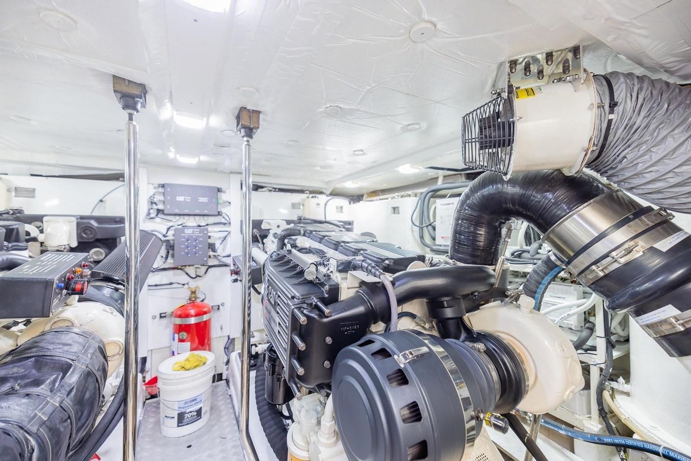 a large machine in a room aboard COOL BREEZE Yacht for Sale