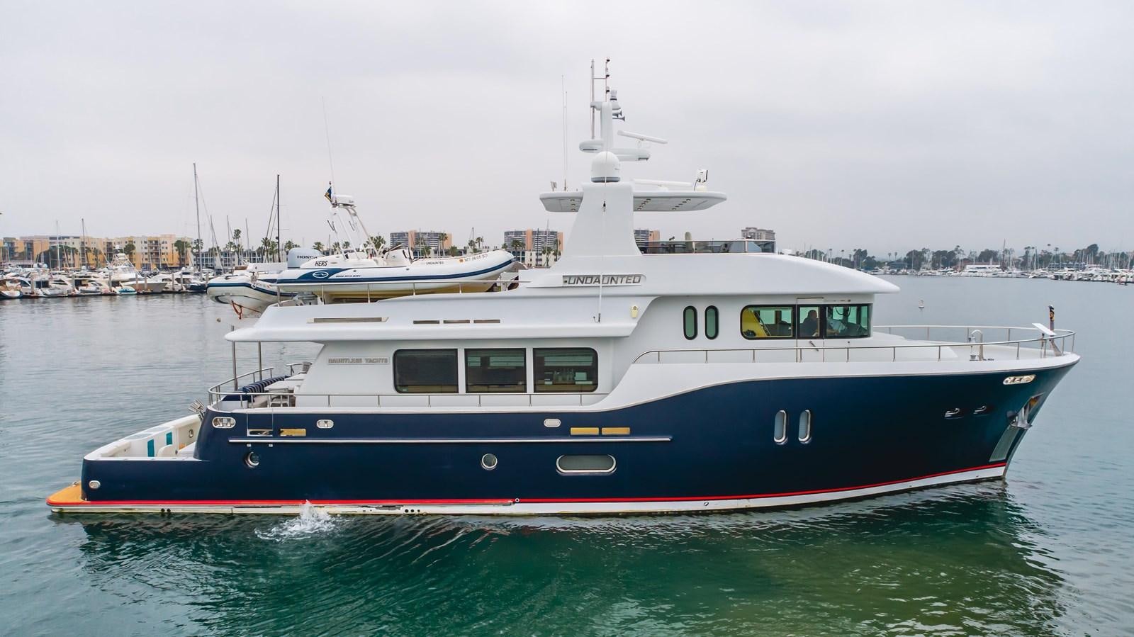 a boat in the water aboard UNDAUNTED Yacht for Sale