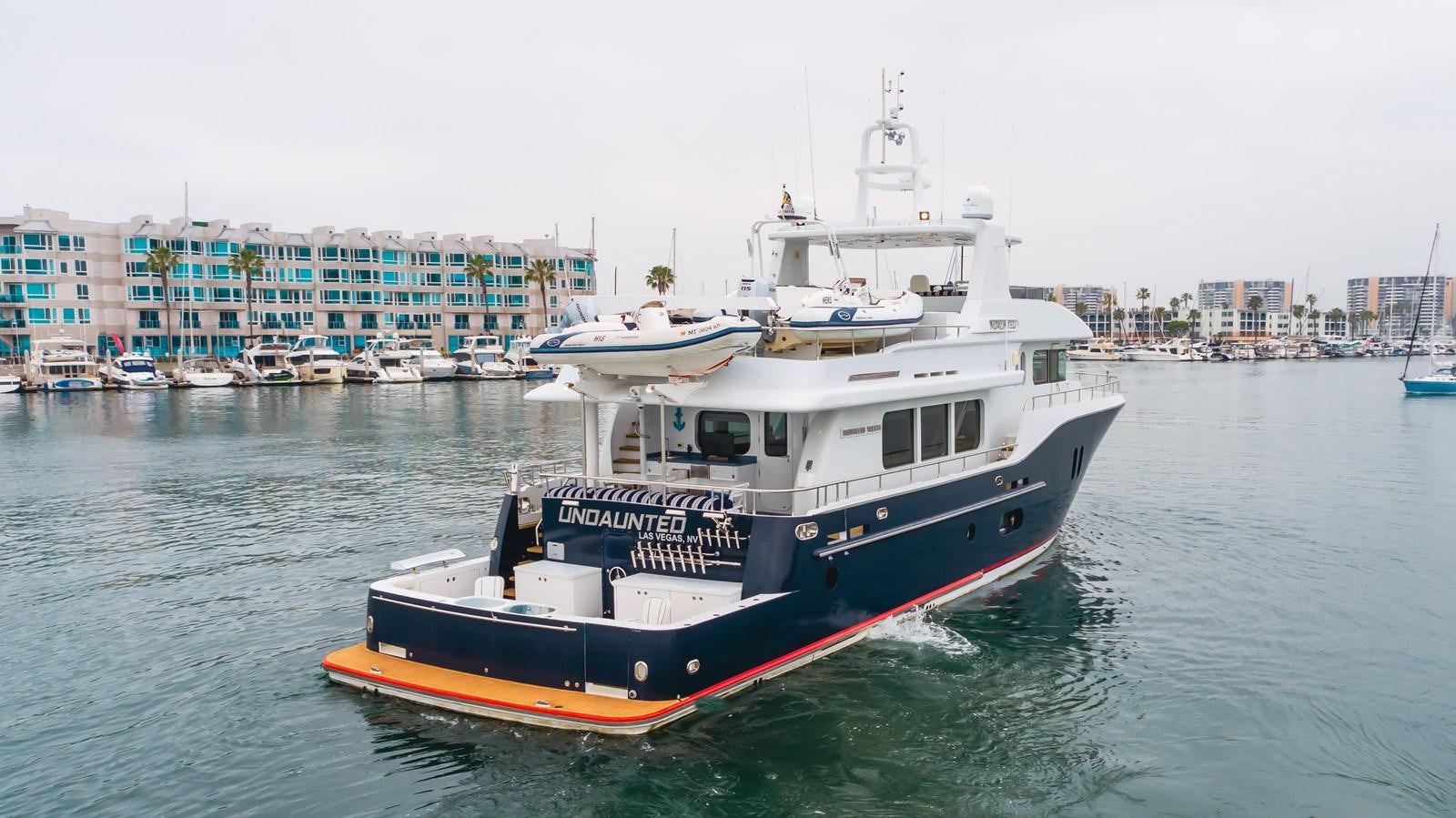 a boat in the water aboard UNDAUNTED Yacht for Sale