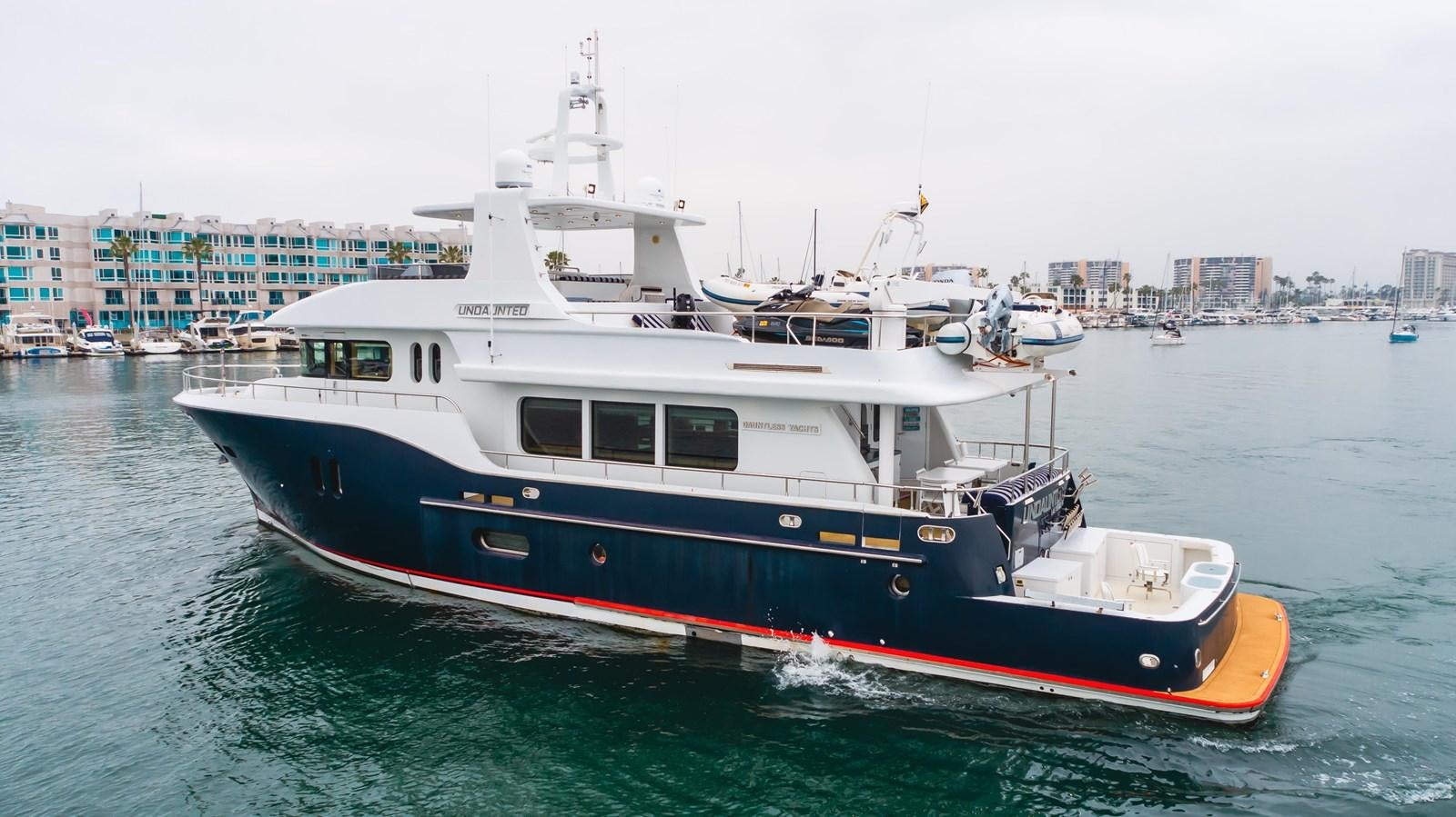 a boat on the water aboard UNDAUNTED Yacht for Sale