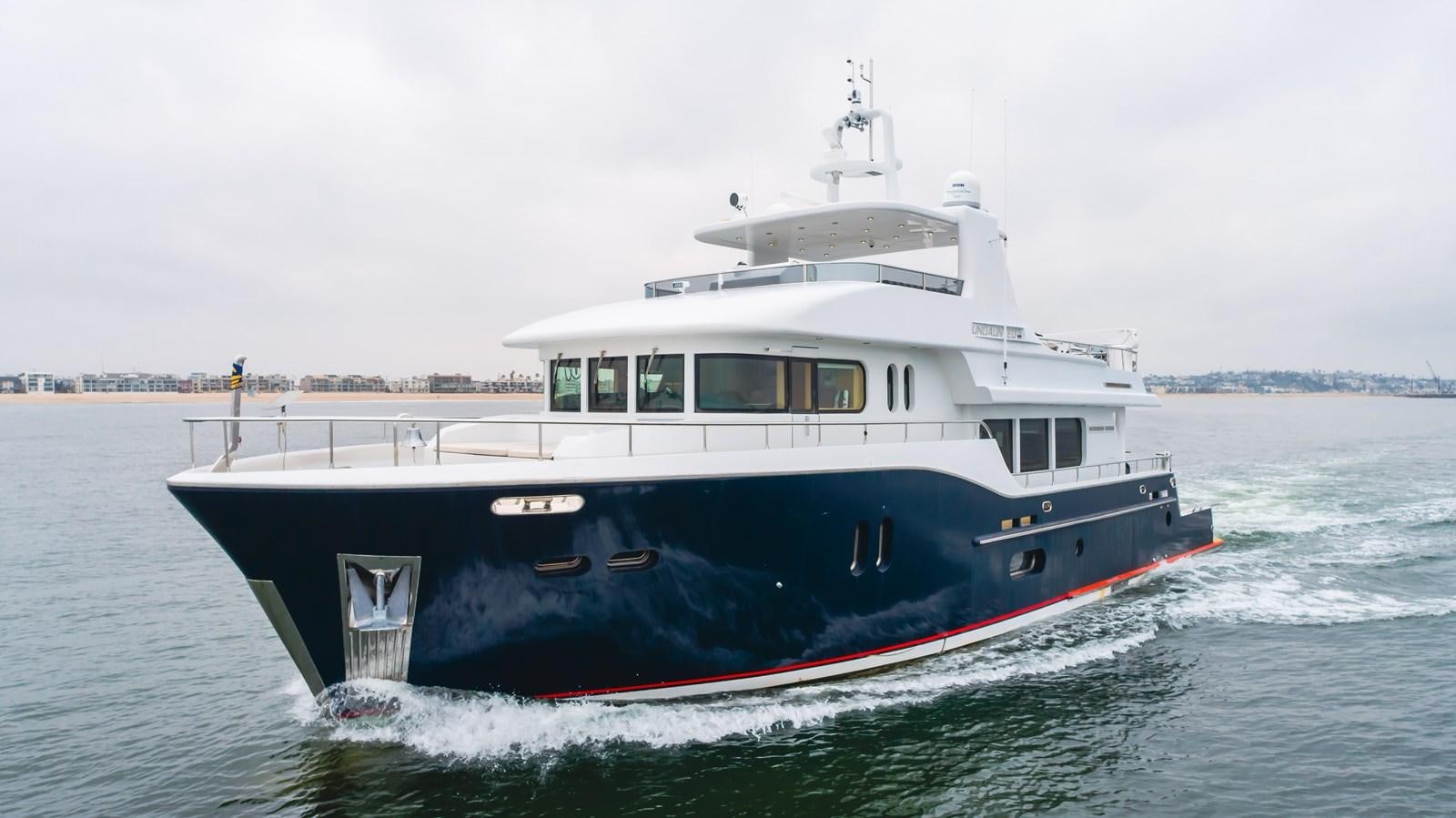 a boat on the water aboard UNDAUNTED Yacht for Sale
