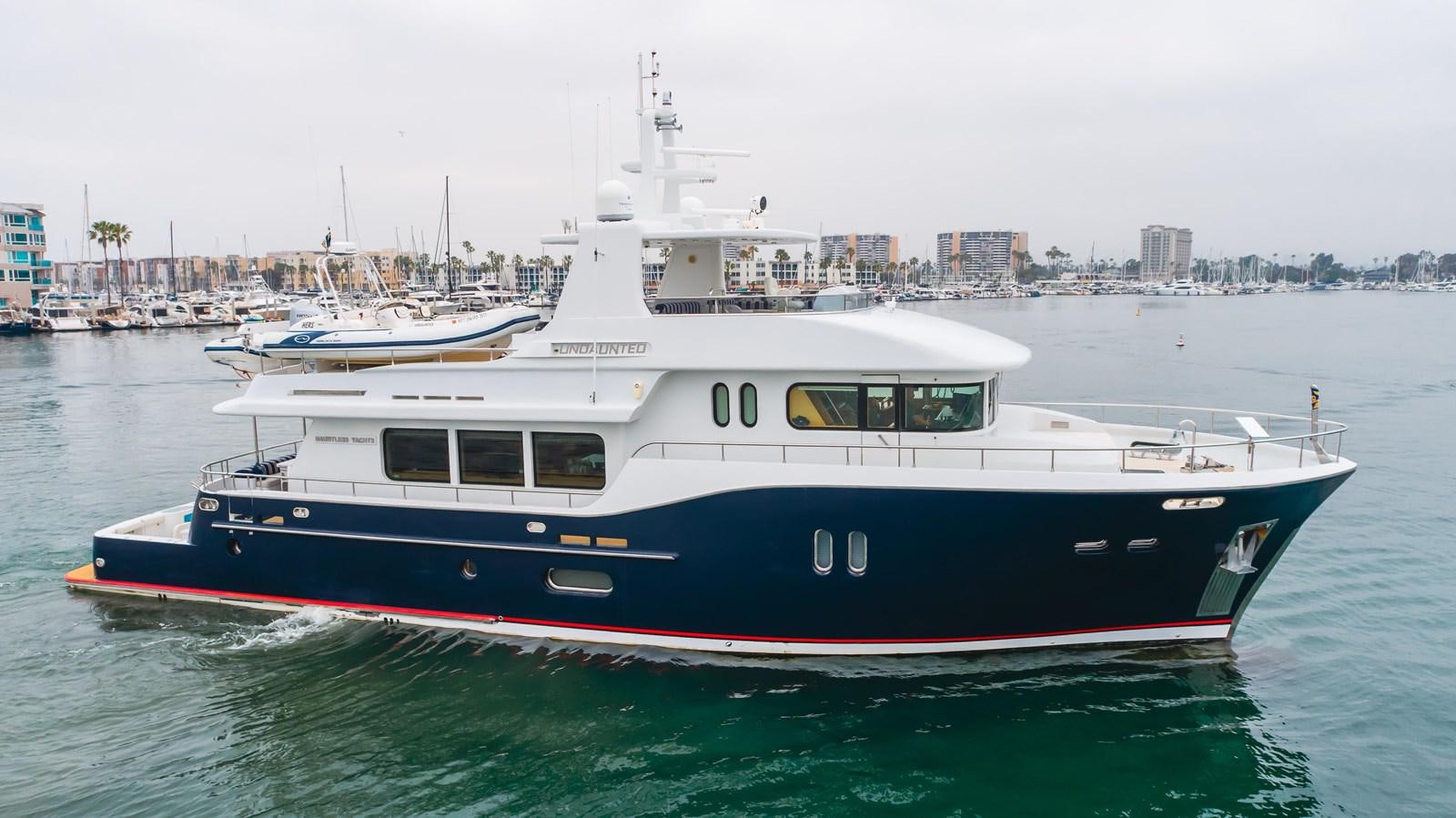 a boat in the water aboard UNDAUNTED Yacht for Sale
