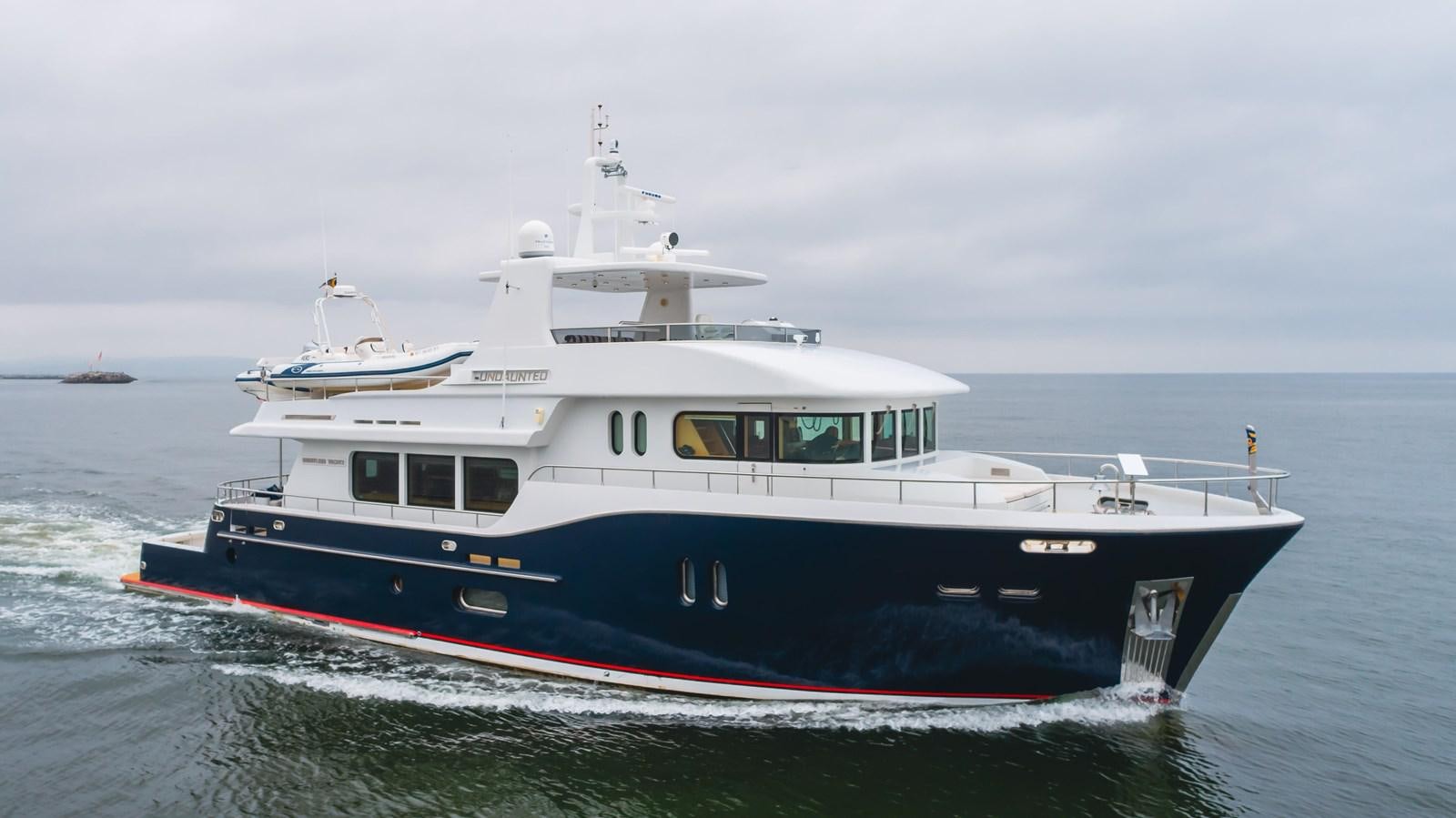 a boat on the water aboard UNDAUNTED Yacht for Sale