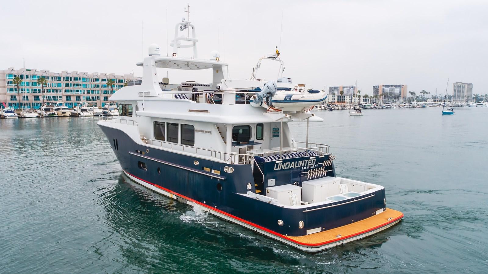 a boat on the water aboard UNDAUNTED Yacht for Sale