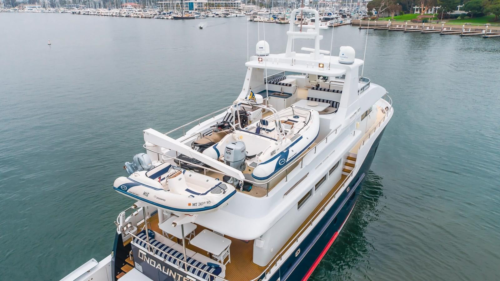 a boat on the water aboard UNDAUNTED Yacht for Sale