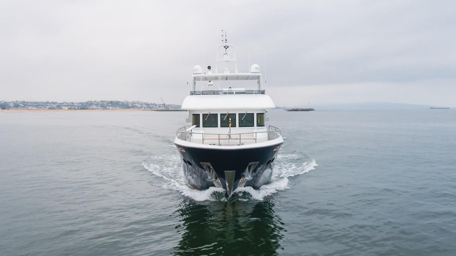 a boat on the water aboard UNDAUNTED Yacht for Sale