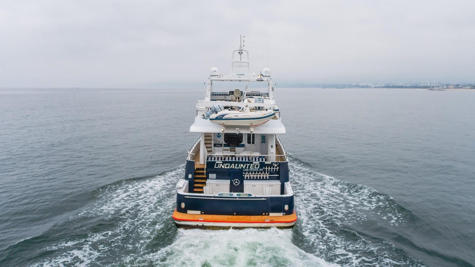 a boat on the water aboard UNDAUNTED Yacht for Sale
