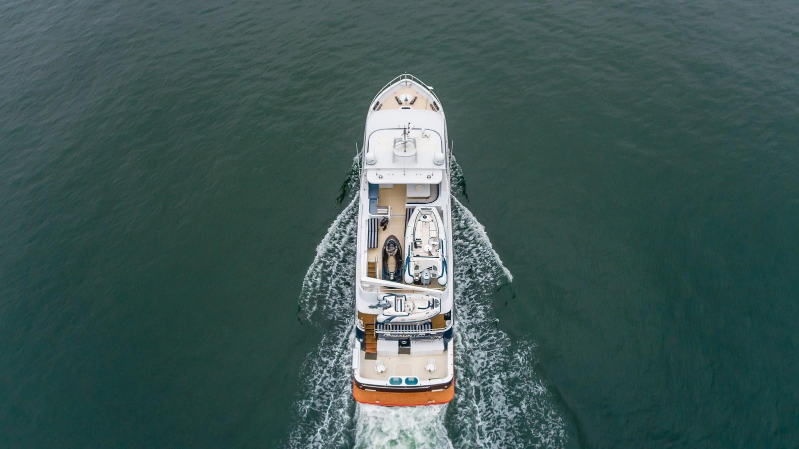a ship in the water aboard UNDAUNTED Yacht for Sale