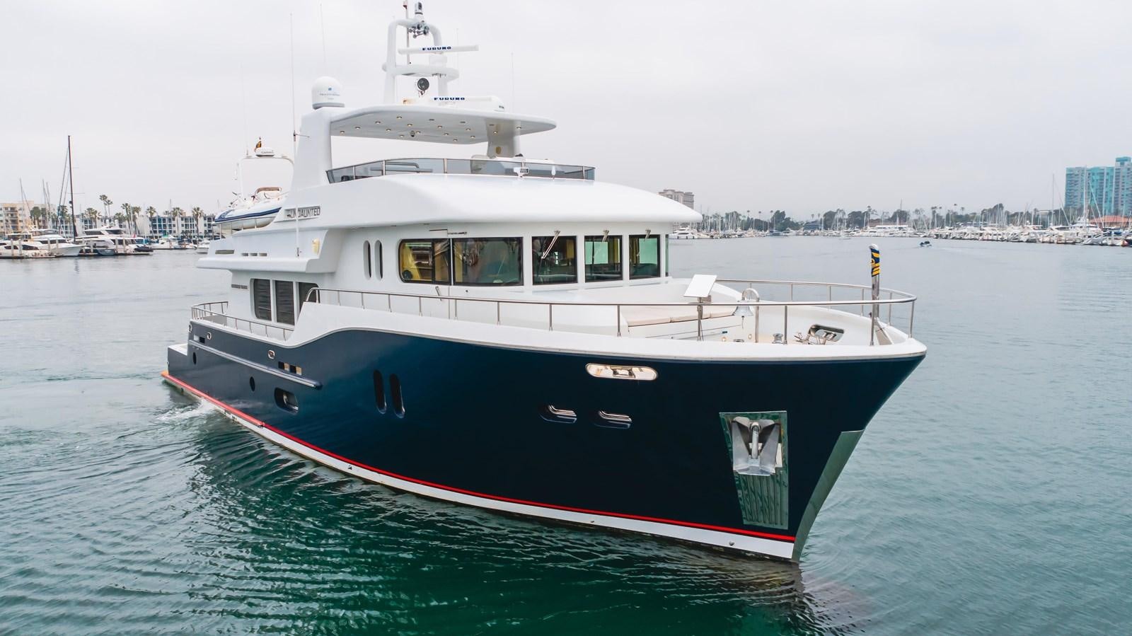 a boat in the water aboard UNDAUNTED Yacht for Sale