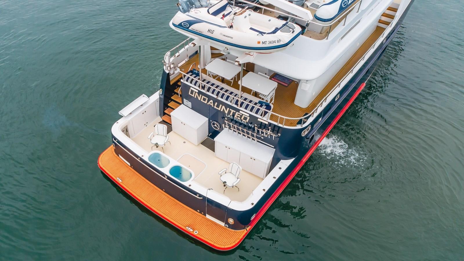a boat on the water aboard UNDAUNTED Yacht for Sale