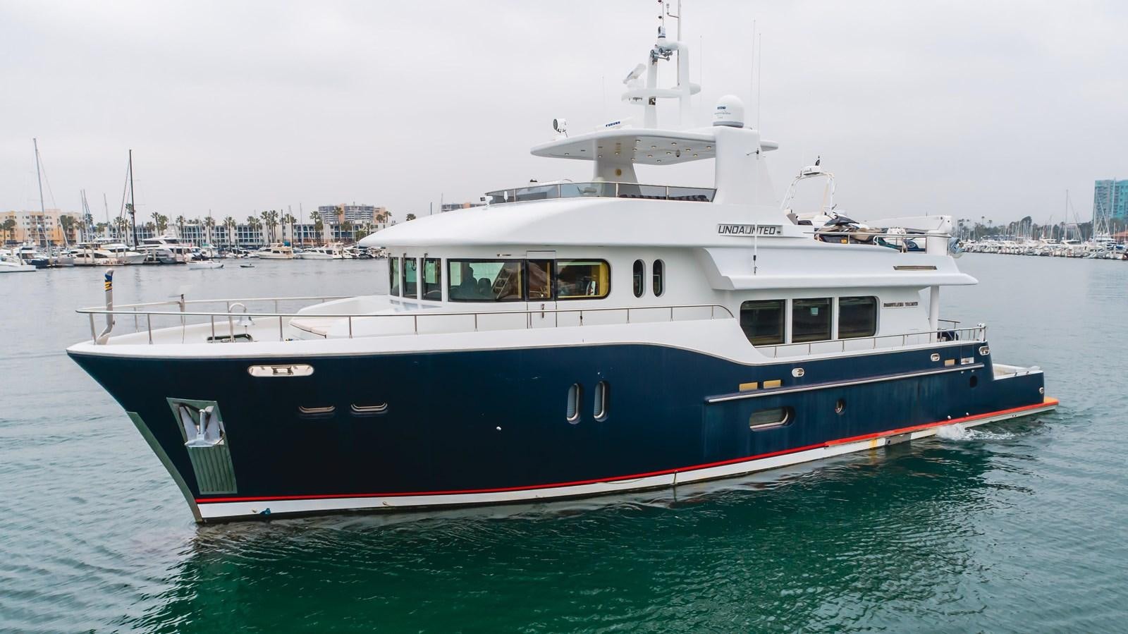 a boat in the water aboard UNDAUNTED Yacht for Sale