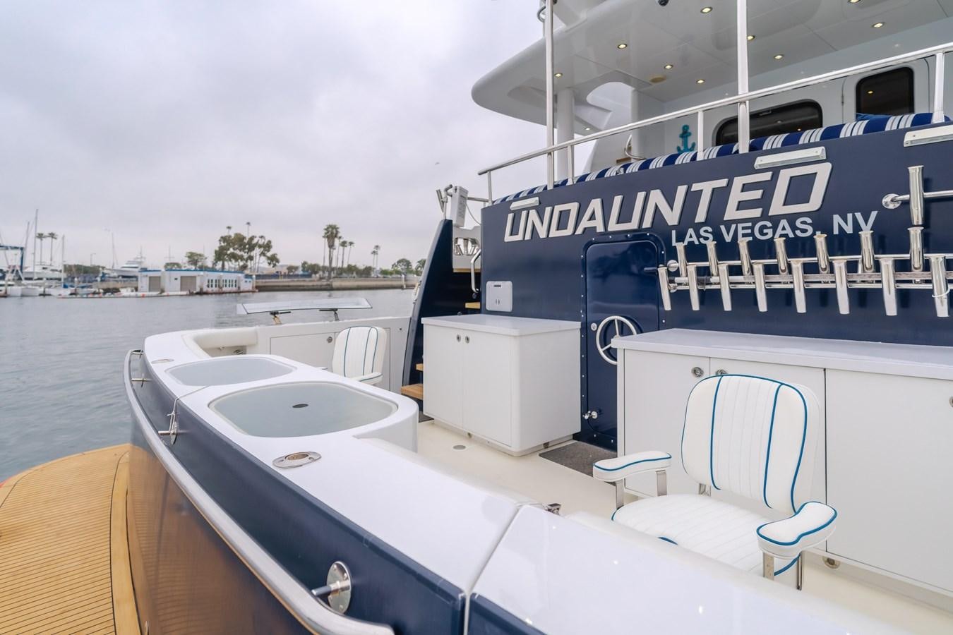 a boat on the water aboard UNDAUNTED Yacht for Sale