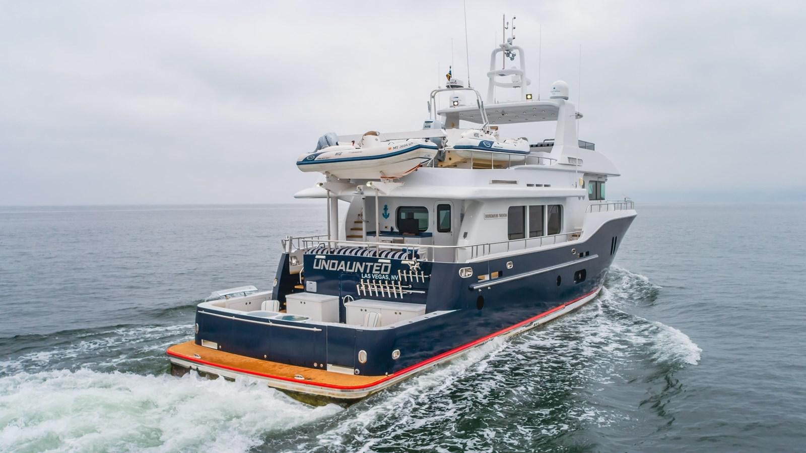 a boat in the water aboard UNDAUNTED Yacht for Sale