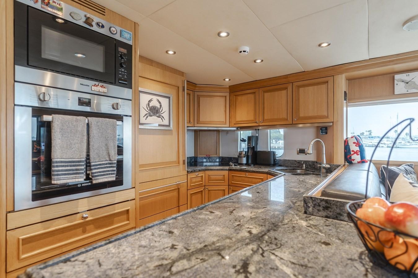a kitchen with granite counter tops aboard UNDAUNTED Yacht for Sale