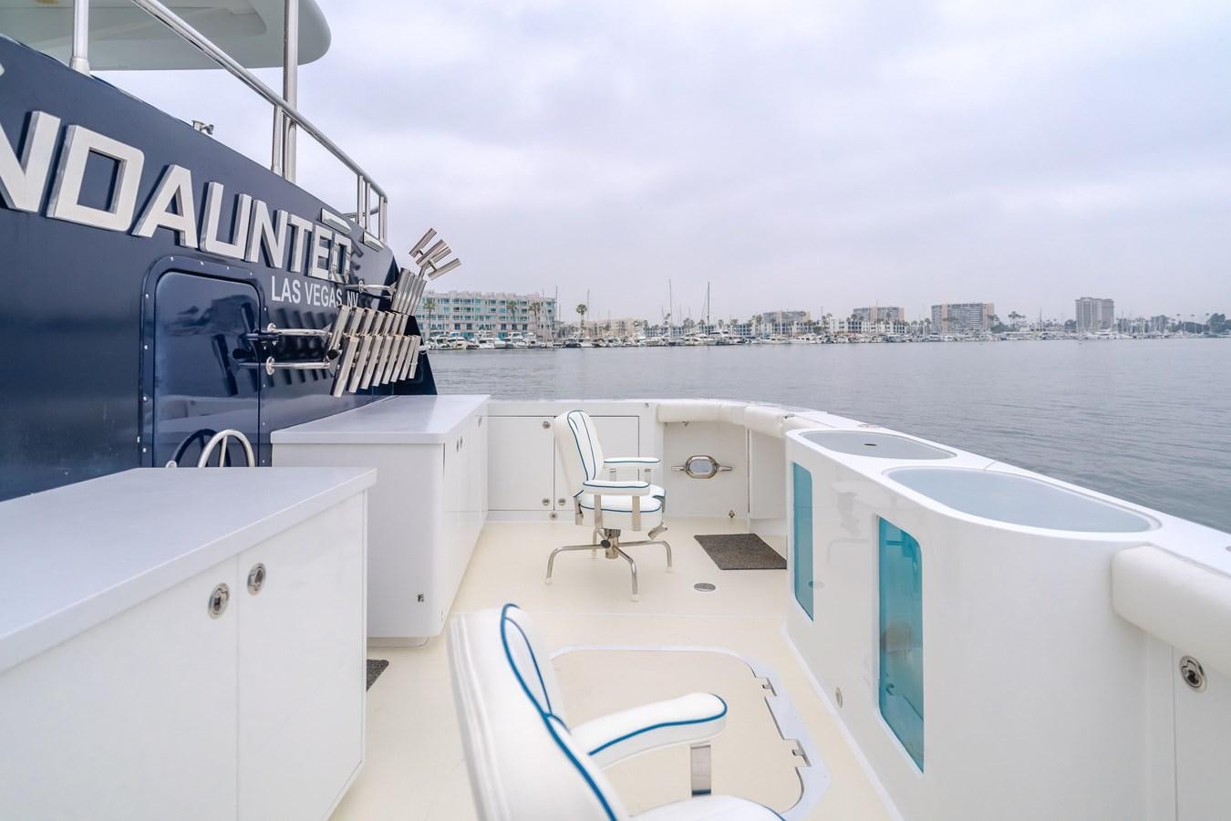a boat on the water aboard UNDAUNTED Yacht for Sale